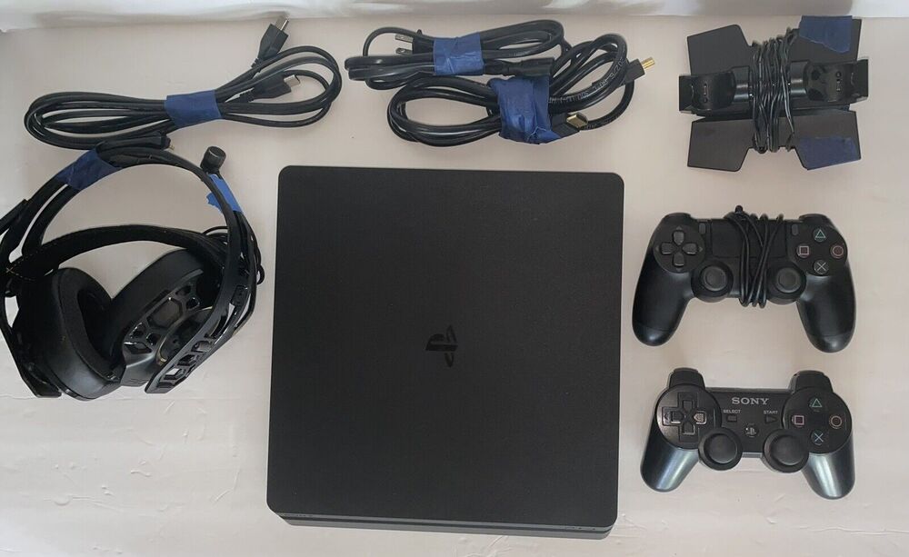 PS4, 2 Wireless Controllers, Power Cords, Charging Station Headphones W/Mic
